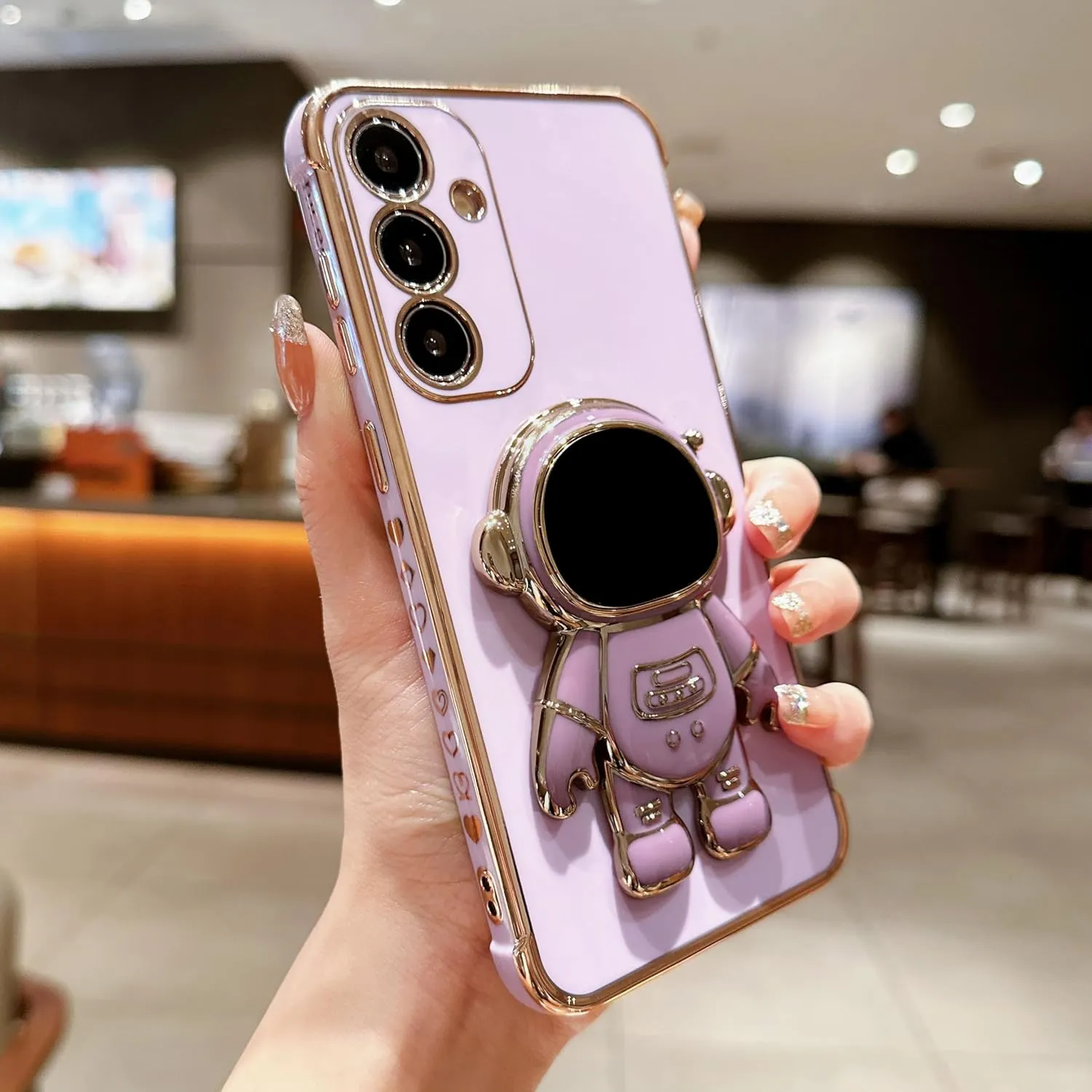 phylla Phone Case for Samsung Galaxy S25  Plus 5g 6.8",Luxury Plating Astronaut Stand Holder Case with Cute Love Heart Side Small Pattern Soft Silicone Shockproof Kickstand Cover Bumper (Purple)